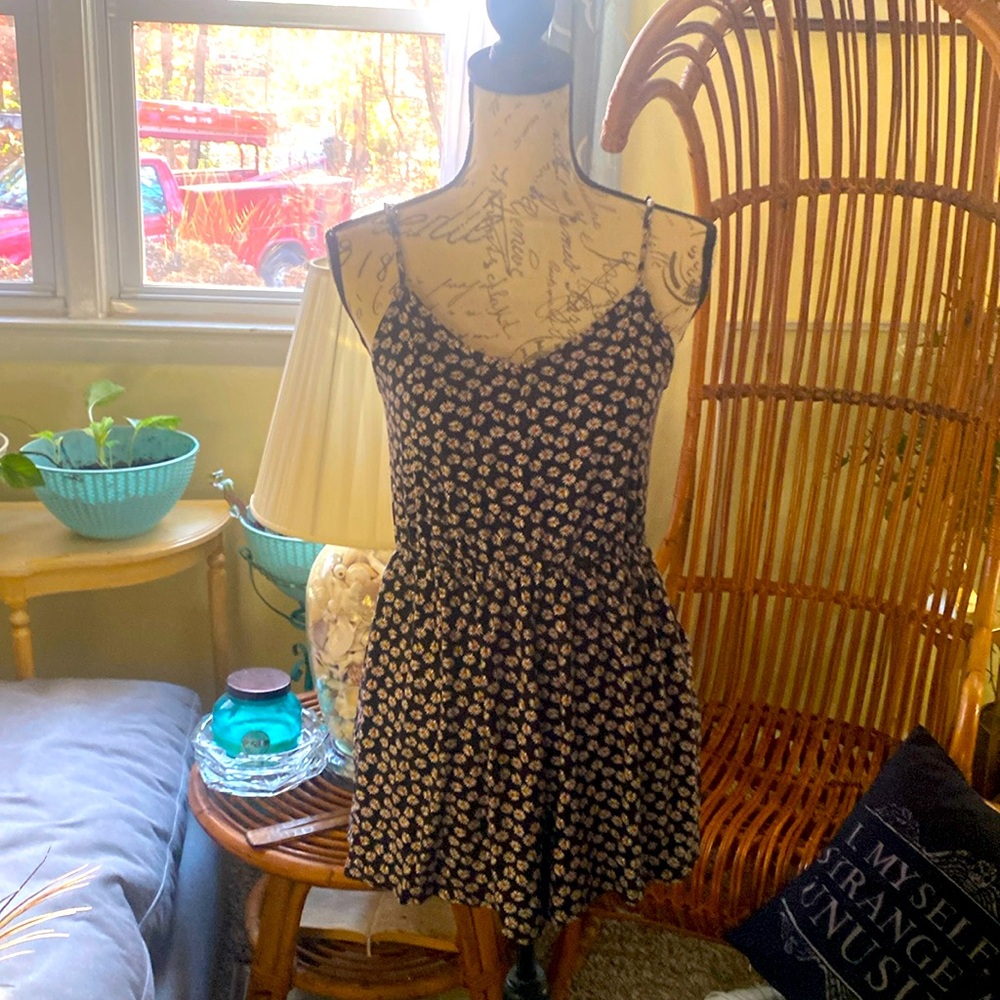 Navy with sunflower print romper